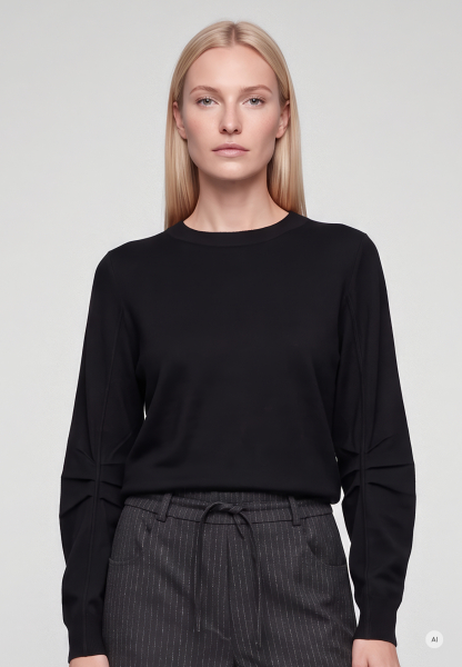 Sweater with pleated details