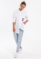 Oversized blouse with number print on the breast pocket