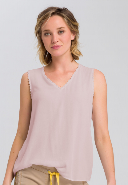 Blouse top with pointed edge