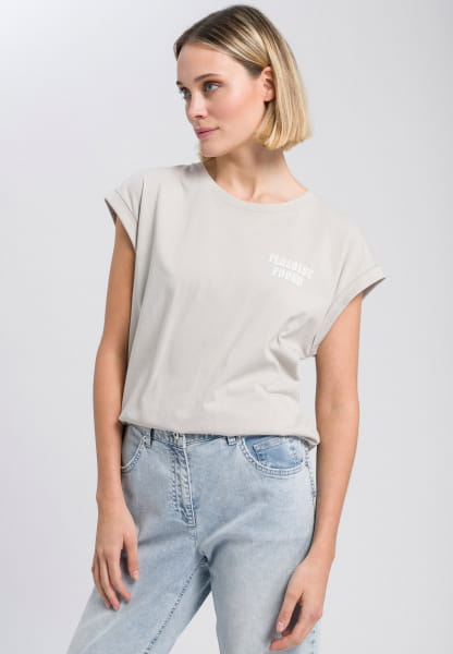 Shirt with "Paradise Found" motto print