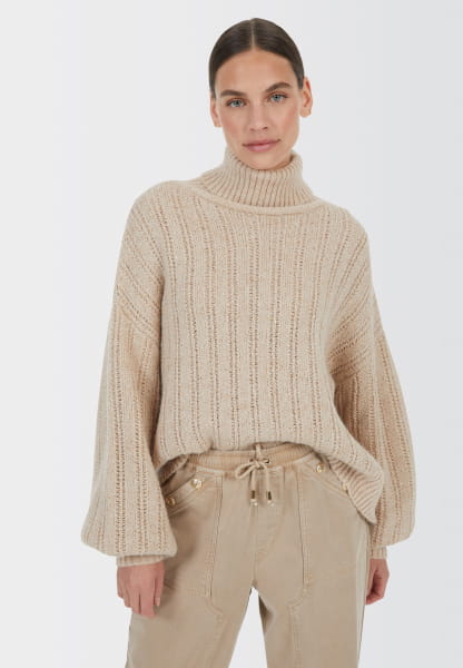 Sweater with sequin ribs