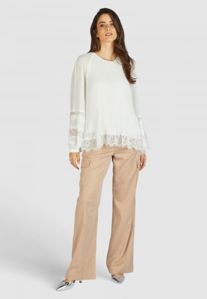 Pleated blouse with lace details