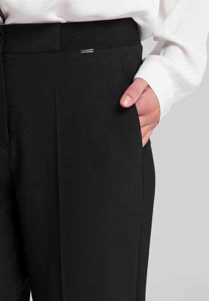 Fabric trousers with an elastic waistband
