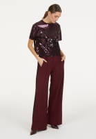 Paillettenshirt im College Look