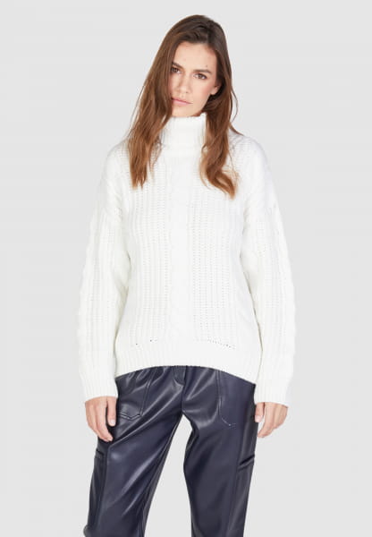 Turtleneck sweater with cable pattern