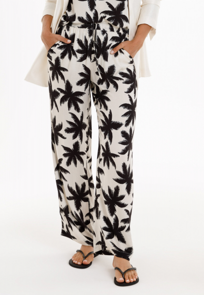 Pajama pants with palm tree print