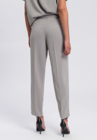 Pleated trousers made from crease-free material