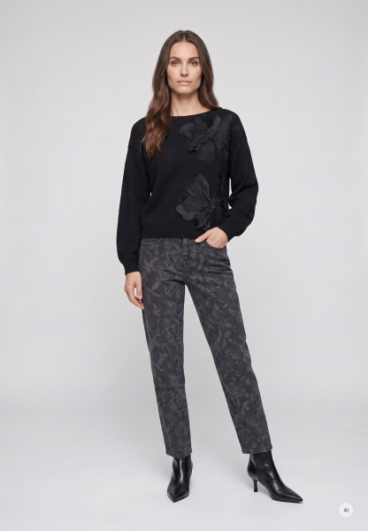 Sweater with floral applications