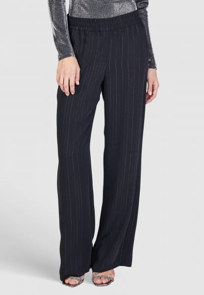 Pants with lurex stripes