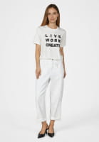 Shirt with leather flowers