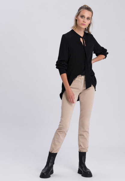 Slip-on blouse with stepped skirt