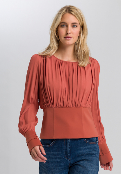 Blouse with ripple effect