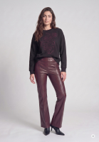 Sweater with crimp embroidery