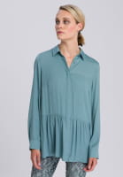 Blouse with flared step