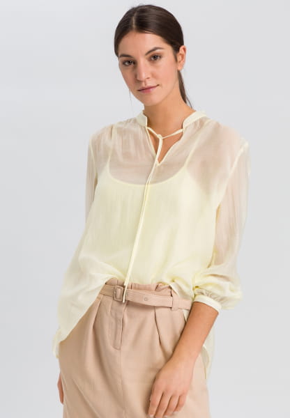 Blouse with stand-up collar