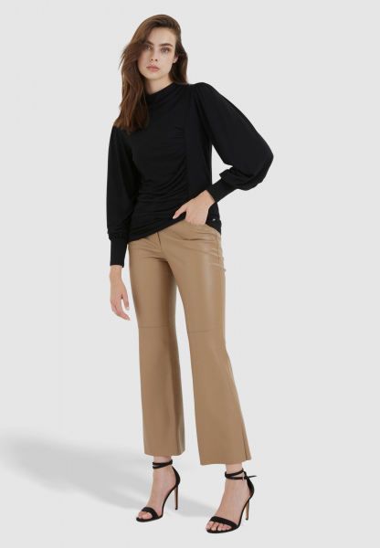Vegan leather pants in a flared look