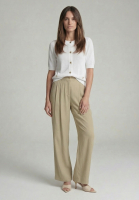 Pleated pants made from shiny twill