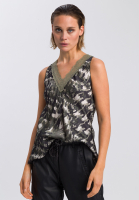 Top with abstract camouflage print