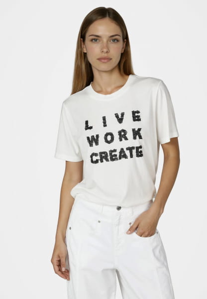 Shirt with leather flowers