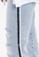 Slim-fit jeans with decorative destroyed effects