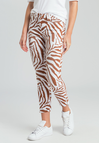 Jeans with tiger-allover pattern