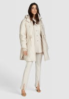 Poncho style quilted jacket