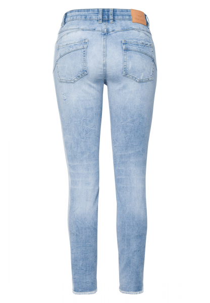 5-pocket jeans with fringed hem and destroys