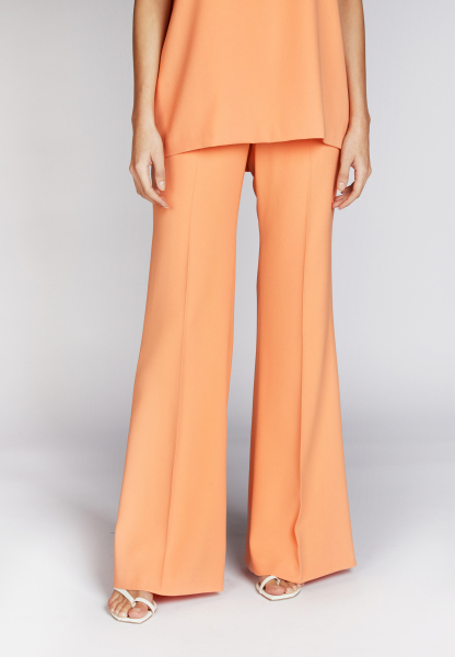 Flared pants made from matte comfort satin