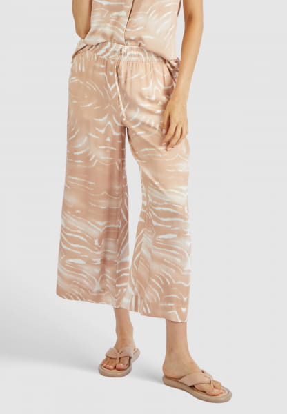 Cropped slip trousers with geometric print