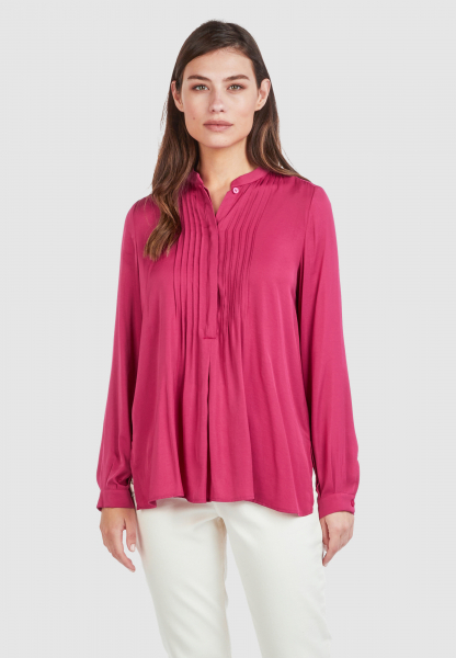 Blouse with pleat details