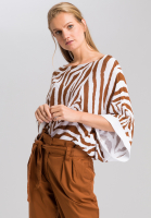 Poncho sweater with tiger pattern