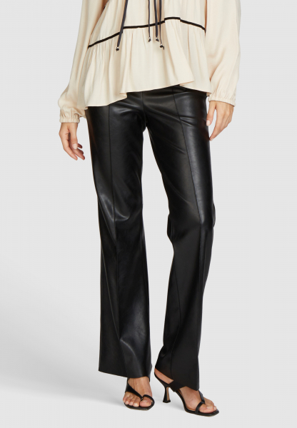 Flared trousers in vegan leather