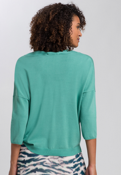 Sweater with shortened sleeves