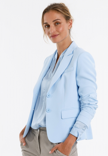 Blazer with large motto embossing on the back