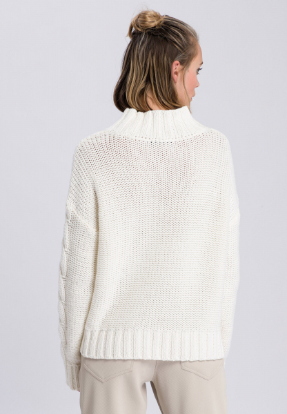 Sweater with broad cable stitch
