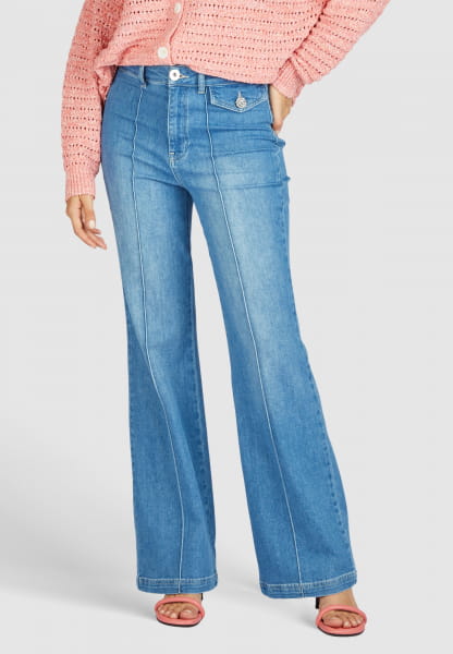Flared jeans with piping