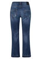 Jeans with decorative distressed effects