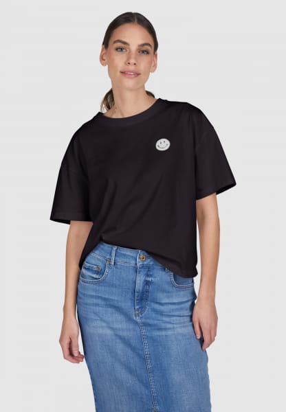 Shirt with smiley application