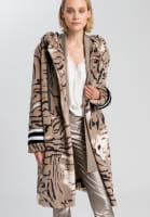 Faux fur coat with abstract animal print and badges