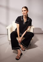 Knitted pants with contrasting edges