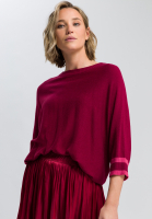 Poncho sweater with contrasting cuffs