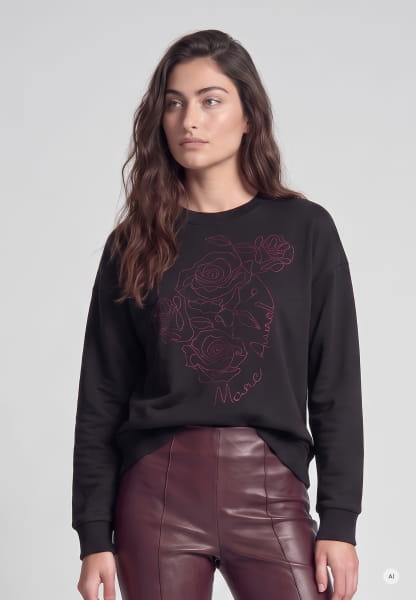 Sweater with crimp embroidery