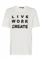 Shirt with leather flowers