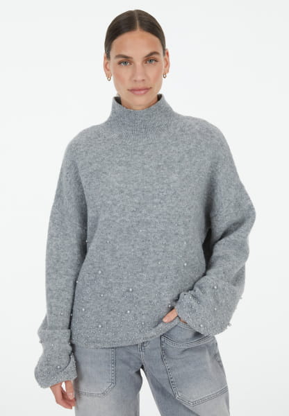 Sweater with beaded appliqué