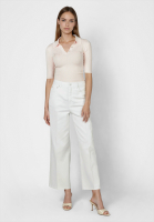 Shirt with decorative buttons