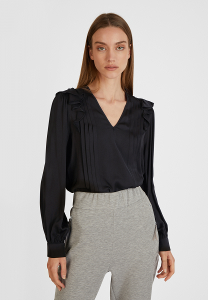 Blouse with ruffles in washed satin