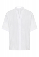 Tunic blouse made from embroidered fabric