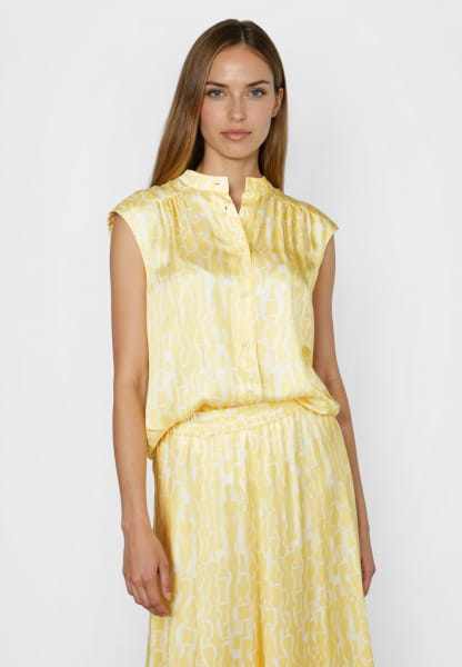 Blouse top with yellow print