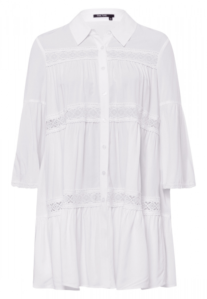 Tunic blouse with lace ribbons