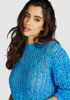 Structured boxy sweater made from ribbon yarn